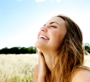 Smiling girl in the sun