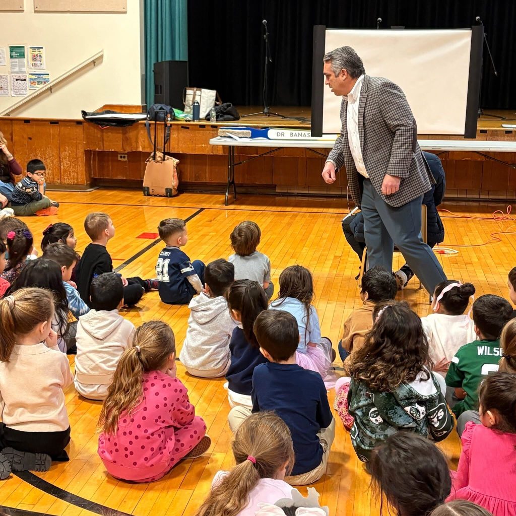 Dentist, Dr. Kenneth Banasiak teaching children about proper oral hygiene in New Jersey